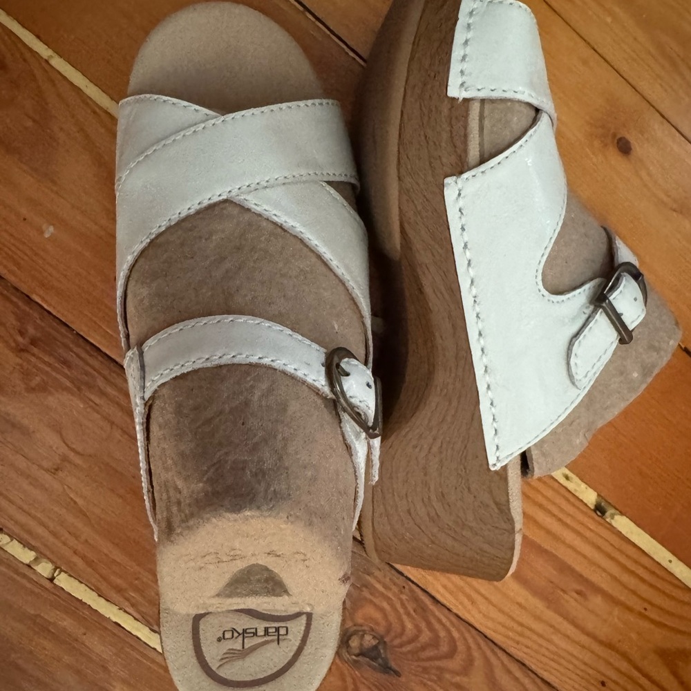 Dansko Sela Crinkle Patent White Platform Shoes with Cross-Strap Design